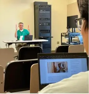 Andy Bechtel talks to the history/journalism students about writing headlines (Photo credit Crystal Wu)